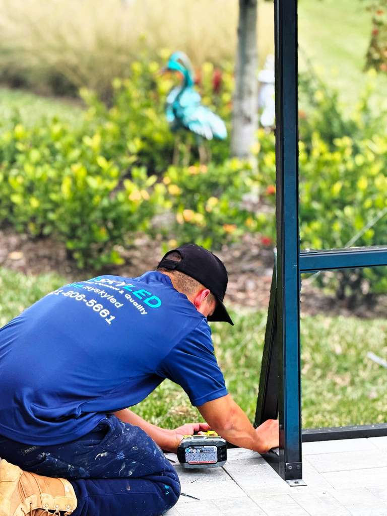 SKY LED technician performing installation
